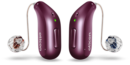 Oticon_Reveal_miniRITE_R_H2-2026_Binaural_C118DeepPlum_Speaker60_OpenBassDome_500pctSize_w_BG_w_shadow_highlight-1